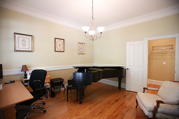Office with exit to hall and half bath